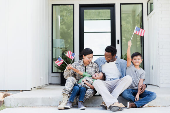 After reunited with her family, a female soldier enjoys spending time with them.